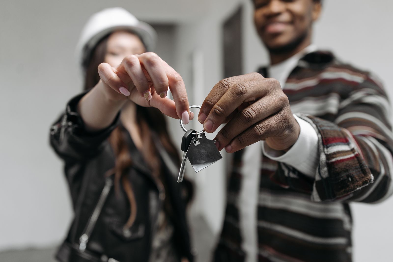 Clients receiving keys to their new home